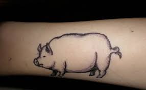 The overwhelming and funny face of the pig with its charming ears and expression are an incredible motivation for the sake of entertainment and vivid animal tattoo designs. Pig Face In Frame With Banner Tattoo Design By Martin Moore