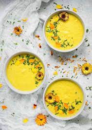A Vibrant And Gorgeous Summer Soup Full Of Bright Sunny Flavors Chilled Yellow Gazpacho Will Become Your Very Light Soups Summer Soup Edible Flowers Recipes