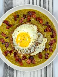 Divide among bowls and top with croutons, bacon, and parsley, if desired. Split Pea Soup With Bacon And Egg The Genetic Chef