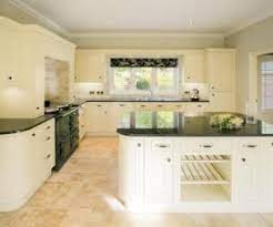 Flooring that combines beauty with the durability of tile. Terracotta Floor Beige Kitchen Trendy Kitchen Tile White Kitchen Units