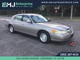 Image result for Light Parchment Gold 1999 Town Car