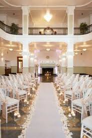 I Like The Angle Of The Chairs The Aisle Runner And I Like The Sashes The Way The Wedding Ceremony Chairs Indoor Wedding Ceremonies Wedding Aisle Decorations
