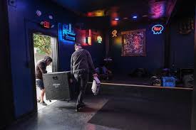 Seattle's beloved Kraken bar has a new location with the same cool vibe