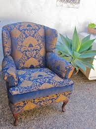 pin by mimi thomas on for the home gold pattern wingback chair blue gold