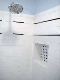 A background of vibrant yellow tiles framed by cream subway tiles is a guaranteed way to make a sunny statement in the bathroom. Small White Theme Shower Decoration White Subway Tile Shower Design Black And White Wal White Subway Tile Shower Subway Tile Showers Subway Tile Shower Designs
