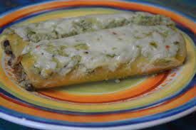 Spoon about 1/4 cup of the filling down the center of each tortilla. Roasted Poblano And Black Bean Enchiladas Cookingwiththecatladies