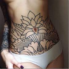 Get used with seeing flowers as side and lower stomach tattoos on women. Feminine Tummy Tattoos For Ladies Nexttattoos