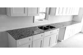 Ideas for a kitchen with brick walls. White Granite Kitchen White Granite Countertops More Com