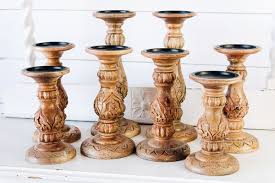 Pillar candle holder will infuse your home decor with graceful colors and a unique design. Wood Carved Pillar Candle Holders Fort Worth Event Rentals Sugar Creek Event Rentals