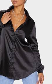 This one is high on drama with cascading sleeves, raw edged with chiffon. Black Satin Button Front Shirt Tops Prettylittlething Usa