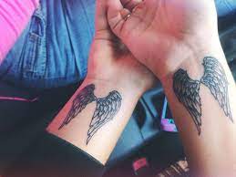 115 Of The Most Gorgeous Beautiful Pretty And Touching Angel Wing Tattoos Of All Time Join Us As We Tattoos For Daughters Wing Tattoos On Wrist Neck Tattoo
