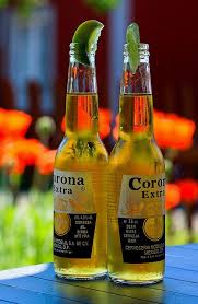 Two Ice Cold Corona With Lime Corona Beer Bottle Beer Beer Bottle