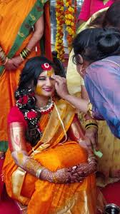 Haldi Look Yellow Saree With Red Floral Jewellery Yellow Saree Haldi Ceremony Bridal Mehendi Designs Hands