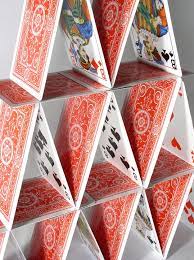 Screenshots show a house of cards being built yet there is no way to make cards go in those positions? Stocks Or Gold Which One Is The House Of Cards