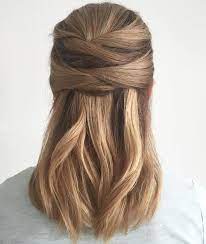 The hair at sides is created into two small braids and dragged opposite side and then fixed with bobby pins. 35 Fetching Hairstyles For Straight Hair To Sport This Season Hair Styles Straight Hair Updo Straight Hairstyles