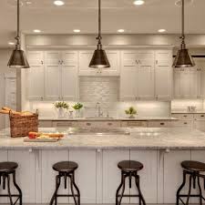 It's always good to have a few lights just hanging around. Woodinville Retreat White Shaker Kitchen White Shaker Kitchen Cabinets Transitional Kitchen