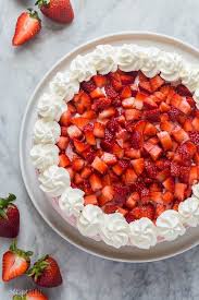 This No Bake Strawberry Cheesecake Is Light Fluffy And Loaded With Strawberry Puree And Baked Strawberries Strawberry Cheesecake Recipe Strawberry Cheesecake