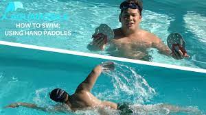 How To Swim Using Hand Paddles Youtube