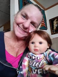 It's heartwarming to see her with her dolls