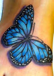 A Tattoo Of A Blue Butterfly On The Woman 39 S Foot Style Realistic Color Blue Tags 3d Beautiful Blue Butterfly Tattoo Butterfly Tattoo Blue Tattoo