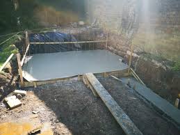 Typical formed concrete walls with integral concrete seats. How To Build A Concrete Slab Or Base For Your Hot Tub
