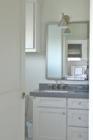 Cabinet has 3 adjustable glass shelves to easily accommodate your belongings and a steel cabinet for durability. Rivet Medicine Cabinet Cottage Bathroom Munger Interiors