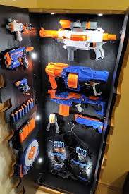 My son has a fairly tame collection, as he has just started to really get into them, but these bulky toys were quickly becoming my nemesis. Morning Flash Nerf Cabinet Nerf N Strike Elite Disruptor 6 Dart Rapid Fire Nerf Gun Blaster 2 Pack Walmart Com Walmart Com You Need A Place For Your Nerf Gun Collection
