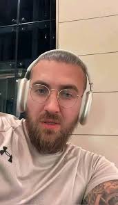 Smiling and baby photo post with negative comment