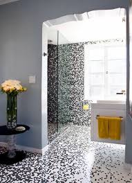 Bathroom features a no threshold shower that boasts black mini floor tiles, white brick wall tiles, white and gray mosaic wall tiles and a black quartz slab floating shower bench. Mosaic Tiles For Bathroom Ideas For 15 Models And Types Of Installation Interior Design Ideas Ofdesign