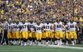 the iowa hawkeyes face the northwestern wildcats in a big