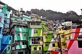 Beginning in santa marta, a favela of approximately 5,000 cariocas, federal aid was administered in order to invigorate the tourism industry. Favela Tour Favela Santa Marta No Rj Turismo Na Suica