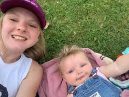 Vicki working at Zinnias boutique today and Friday