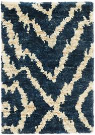 This fashionable zebra black area rug makes a statement wherever it is laid. Dash And Albert Rugs Sahara Animal Print Hand Knotted Navy Area Rug Wayfair