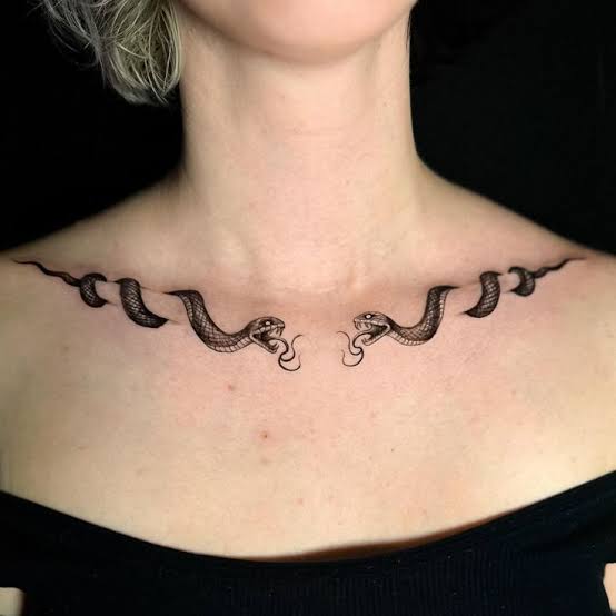 Collarbone Artistry with Creative Dual Snake Tattoos for a Bold Statement - Twin Serpent Embrace