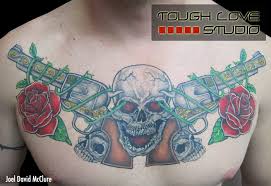 No feature on guns and roses tattoos can be complete without making mention of the lead singer of this hard rock band axel rose. 53 Wonderful Gun Tattoo Designs Styles Picsmine