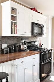 How To Decorate A Kitchen With Black Appliances And White Cabinets Ideas And Updates Black Appliances Kitchen Kitchen Design Home Kitchens