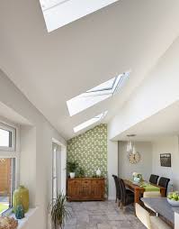 When we moved into our house, the previous people had put standard velux windows in the kitchen extension which had a very shallow pitch roof, which resulted in constant leaking and water ingress, simply because the windows rely on the pitch to drain the water away. Velux Windows In Home Extensions Contemporary Dining Room Kent By Sterlingbuild Houzz