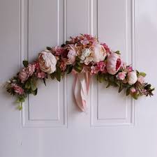 Here is how to make a swag of your own, for a fraction of the cost. Infilm 24inch Artificial Peony Floral Swag With Green Leaves Fake Rose Peony Flowers Wreath Hanging Handmade Garland For Arch Front Mirror Home Wedding Party Door Lintel Backdrop Decoration Wreaths Garlands Home