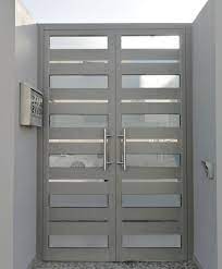 main door باب رئيسي مصنوع من الألمنيوم مع ستانلس ستيل من صناعتنا أحد زيائننا في الشاخورة مصنع الساري لتصميم المنتوجات الخش locker storage storage furniture