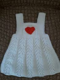 Guzel Kizlarimiza Cok Yakisacak Kolay Ve Guzel Bir Model Malzemeler Beyaz Bebe Yunu 3 5 Numara Sis Suslem Baby Knitting Patterns Orgu Bebek Elbise Modelleri