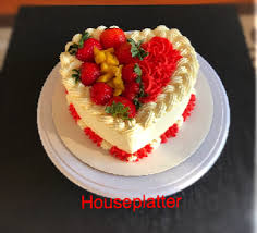 Vanilla sponge cake white frozen cream (whipped) liquid pink color green color for leaves. Cake Gallery Houseplatter