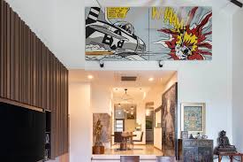 In the upper living room, the picture over the fireplace is wider than tall. High Ceiling Interior Design Singapore Interior Design Ideas
