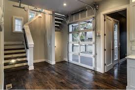 She finally finds the switch, and turns it on. The Story Of A Home 2900 10th Ave S Bynum Design Blog Glass Garage Door Basement Makeover Walkout Basement
