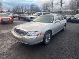Image result for Light Ice Blue 2005 Town Car