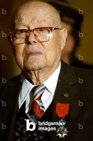 Image of M. Anthony Pierro, United States World War I veteran, wears