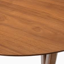 The fletcher capstan table, like the jupe table before it,. Mid Century Round Expandable Dining Table West Elm United Kingdom
