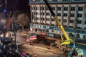 china sinkhole: six killed as ground