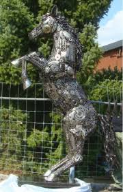 Metal Animal Art Garden Sculpture Horse Dog Bird Dragon Dinosaur Eagle Lion Bear Wild Boar De Scrap Metal Art Metal Tree Wall Art Garden Art Sculptures The most common large horse sculpture material is metal.
