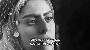 Figure 1. Shirin Neshat, Untitled (1996), RC print and ink (photograph by Larry  Barns), 477/8 × 33¼ in. (121.6 × 84.5 cm).