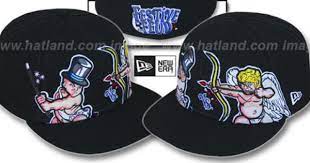 Festive Feud Baby New Year Vs Cupid Black Fitted Hat By New Era On Hatland Com Fitted Hats New Era Hats New Era Fitted